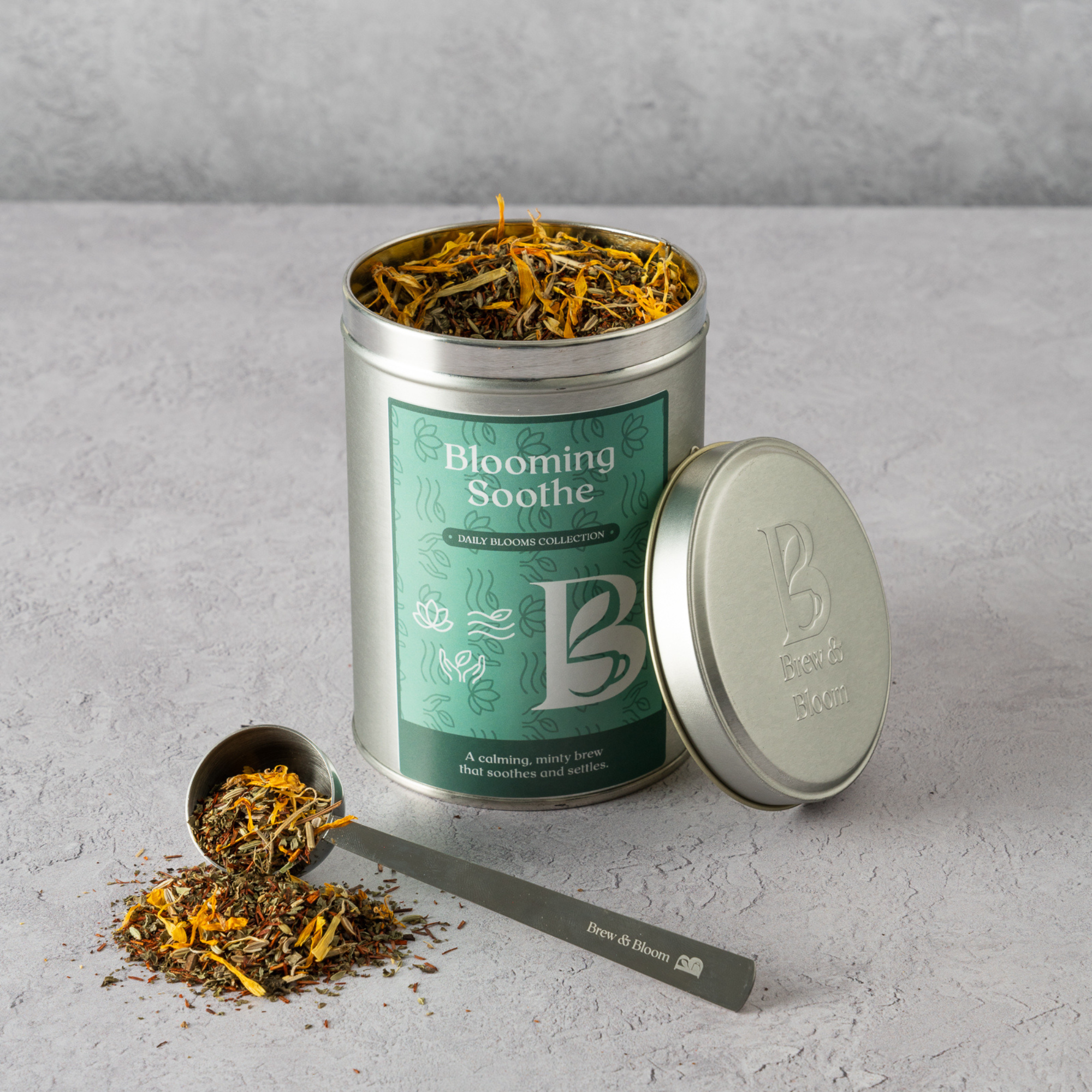Blooming Soothe loose leaf mint tea tin with measuring spoon